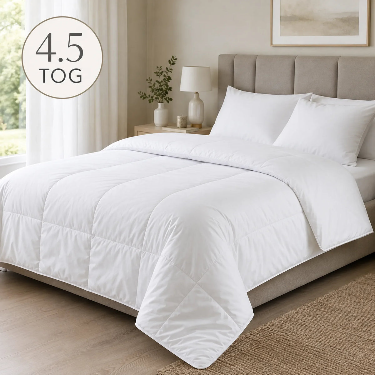 White 4.5 tog duvet styled on a bed in a bright modern UK bedroom