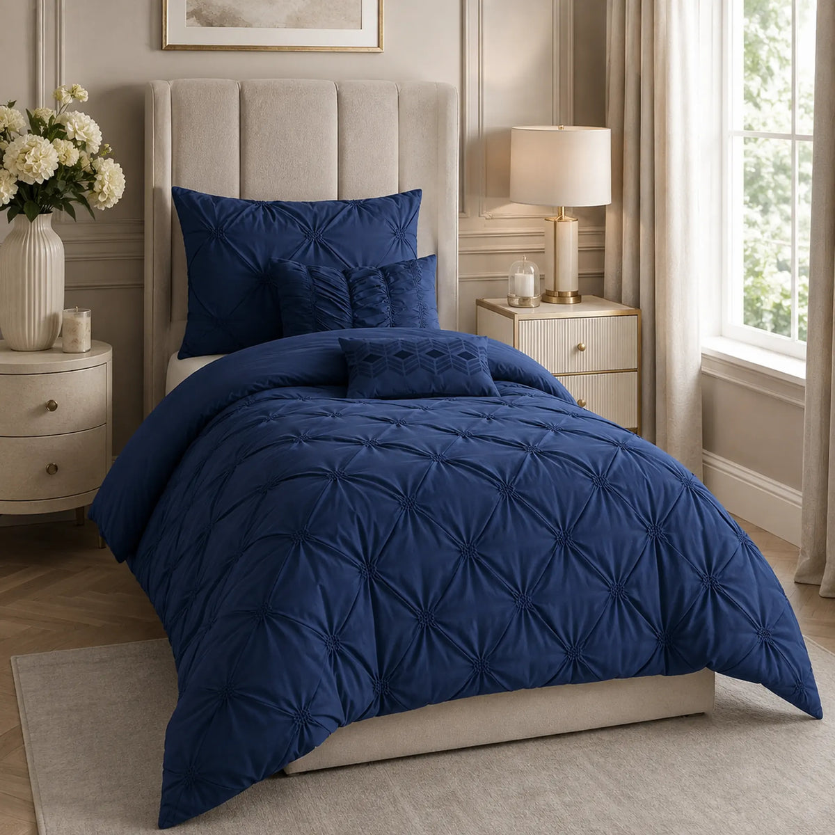 Navy diamond pintuck single duvet cover set styled on a single bed in a luxury UK hotel-style bedroom