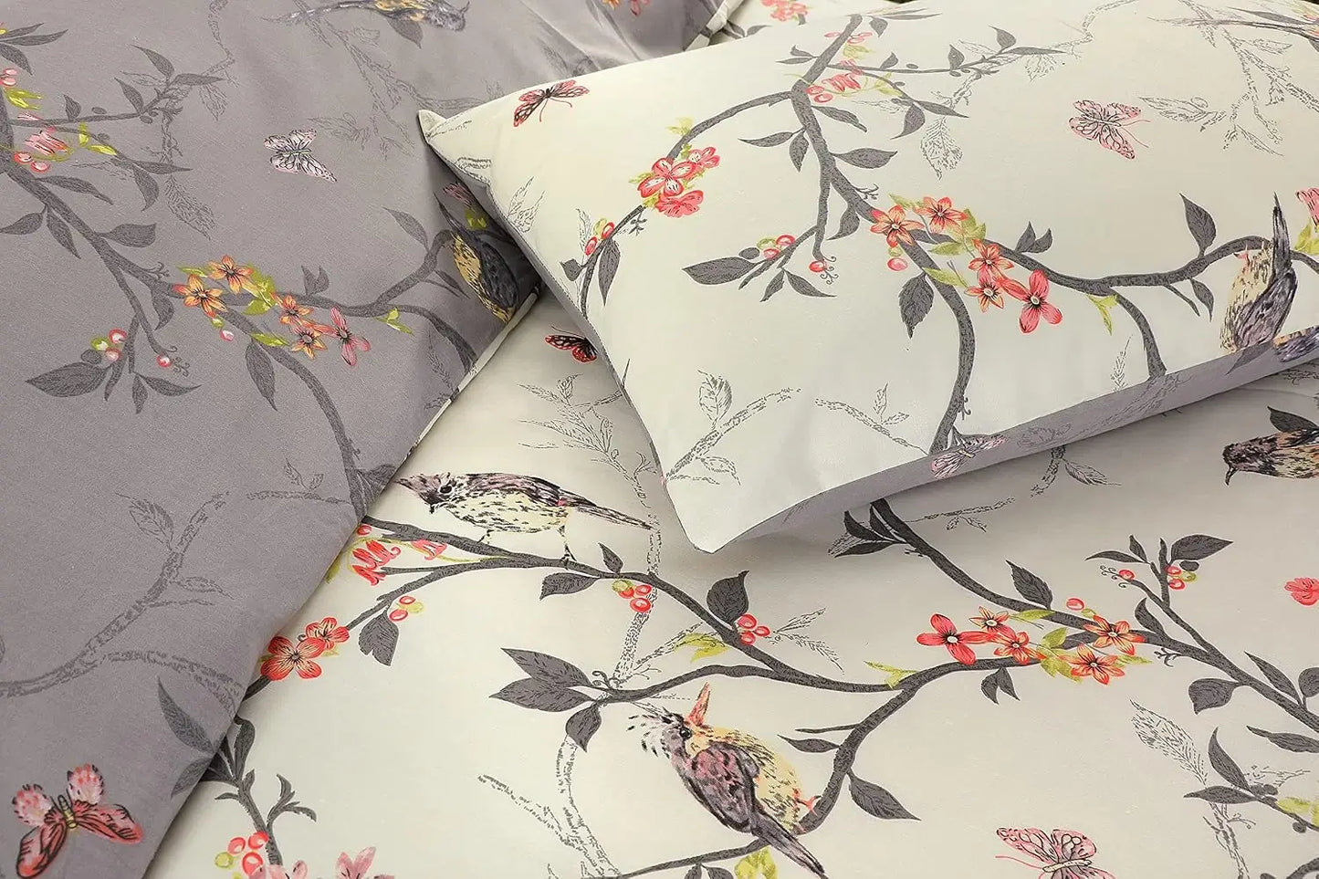 Close-up of cream Caramel Flower bedding with birds on blossom branches