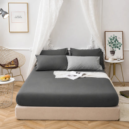 Charcoal Grey 200 thread count 30cm deep fitted sheet on a bed