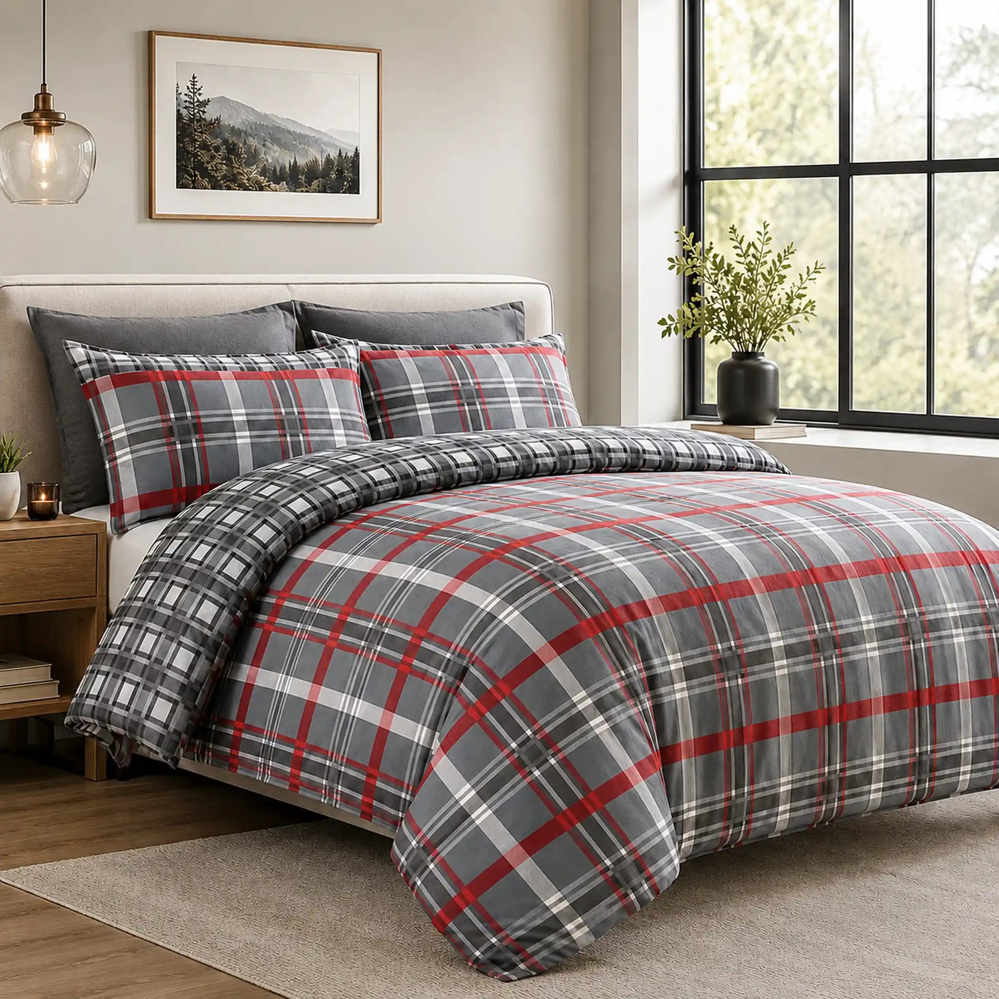 Red and charcoal tartan check duvet cover set styled on a bed