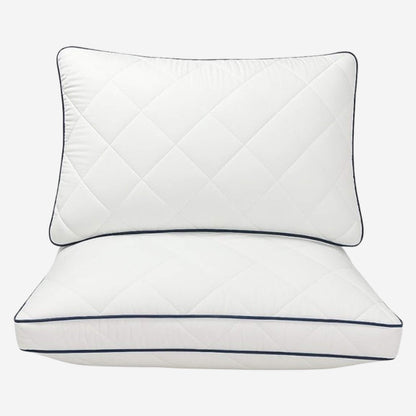 White quilted Cloud Pillows with hotel-style bedding