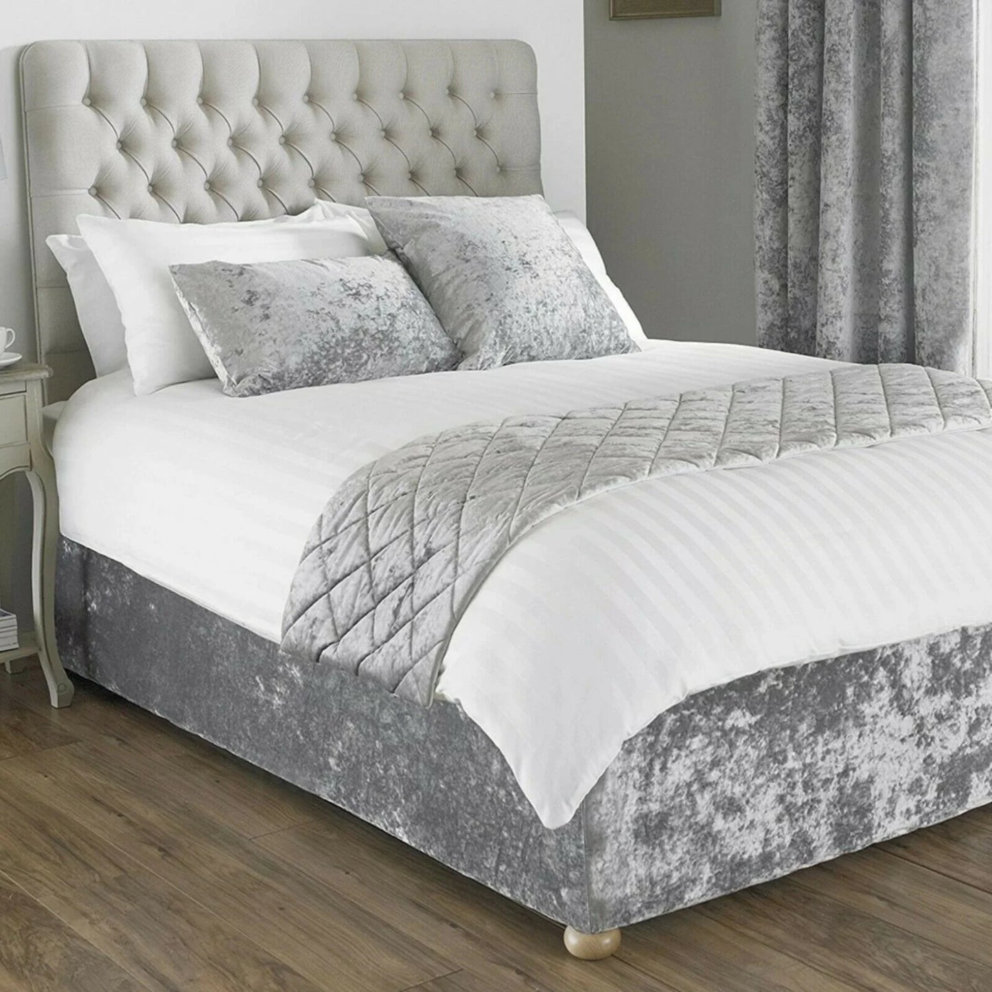 Grey crushed velvet divan base cover styled with matching headboard and cushions