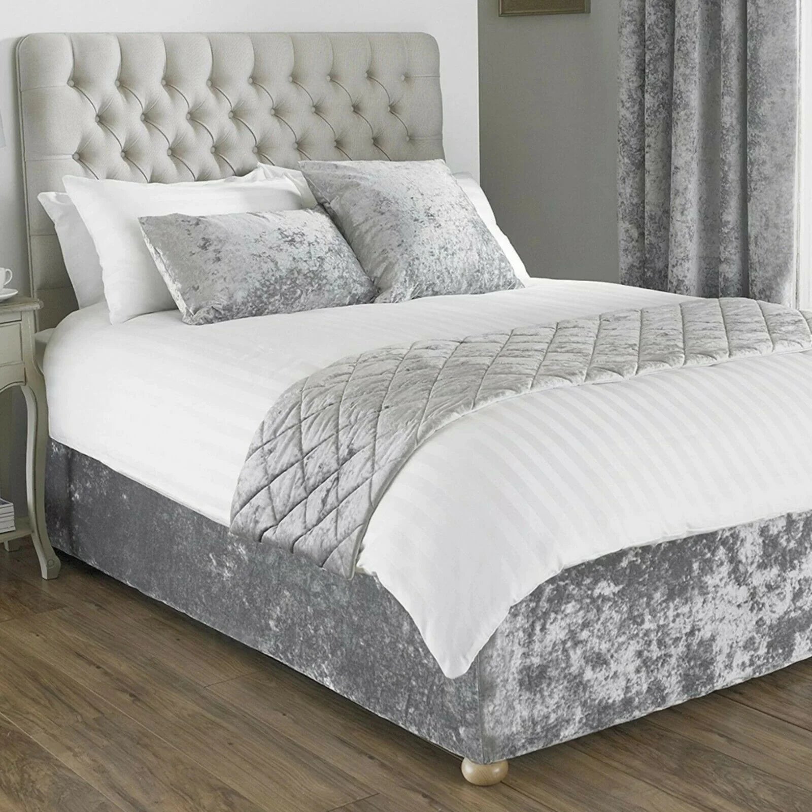 Grey crushed velvet divan base cover styled with matching headboard and cushions