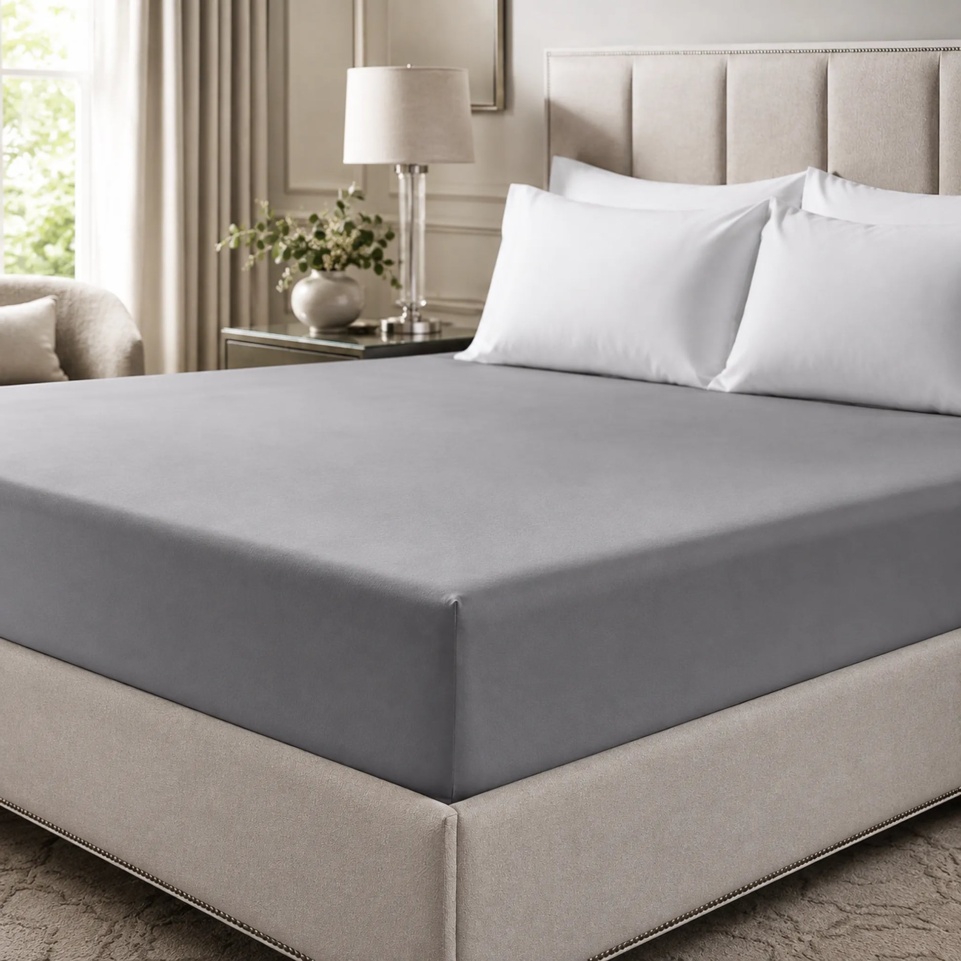 Grey 400 thread count 30cm deep fitted sheet on a bed