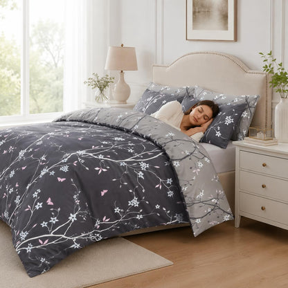 Woman sleeping on grey duvet cover set with white floral print