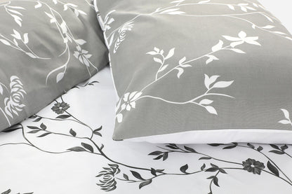Close-up of grey floral duvet cover set showing vine and flower print detail