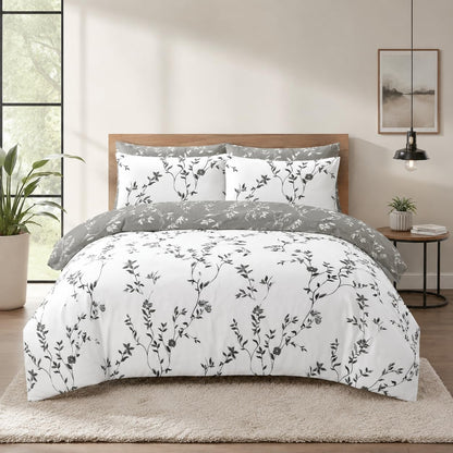 Grey floral duvet cover set showing the reversible white side with grey vine print