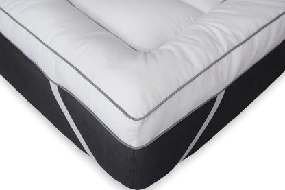 King size mattress topper fitted securely with elasticated corner straps