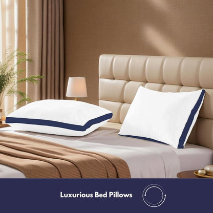 Luxury hotel pillows styled on a bed with white bedding
