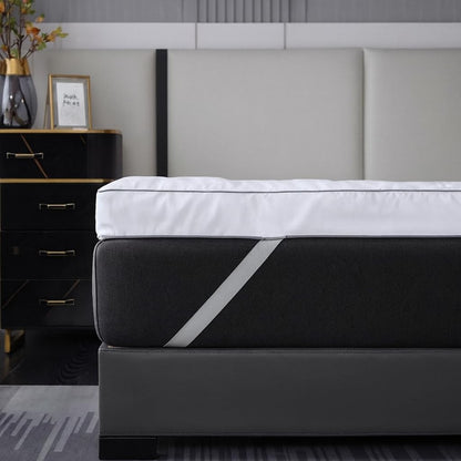 Mattress topper with secure elasticated corner straps fitted to mattress