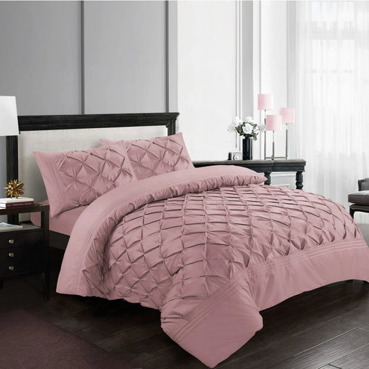 Pink Deluxe Geometric Pintuck Duvet Cover Set with structured folded diamonds