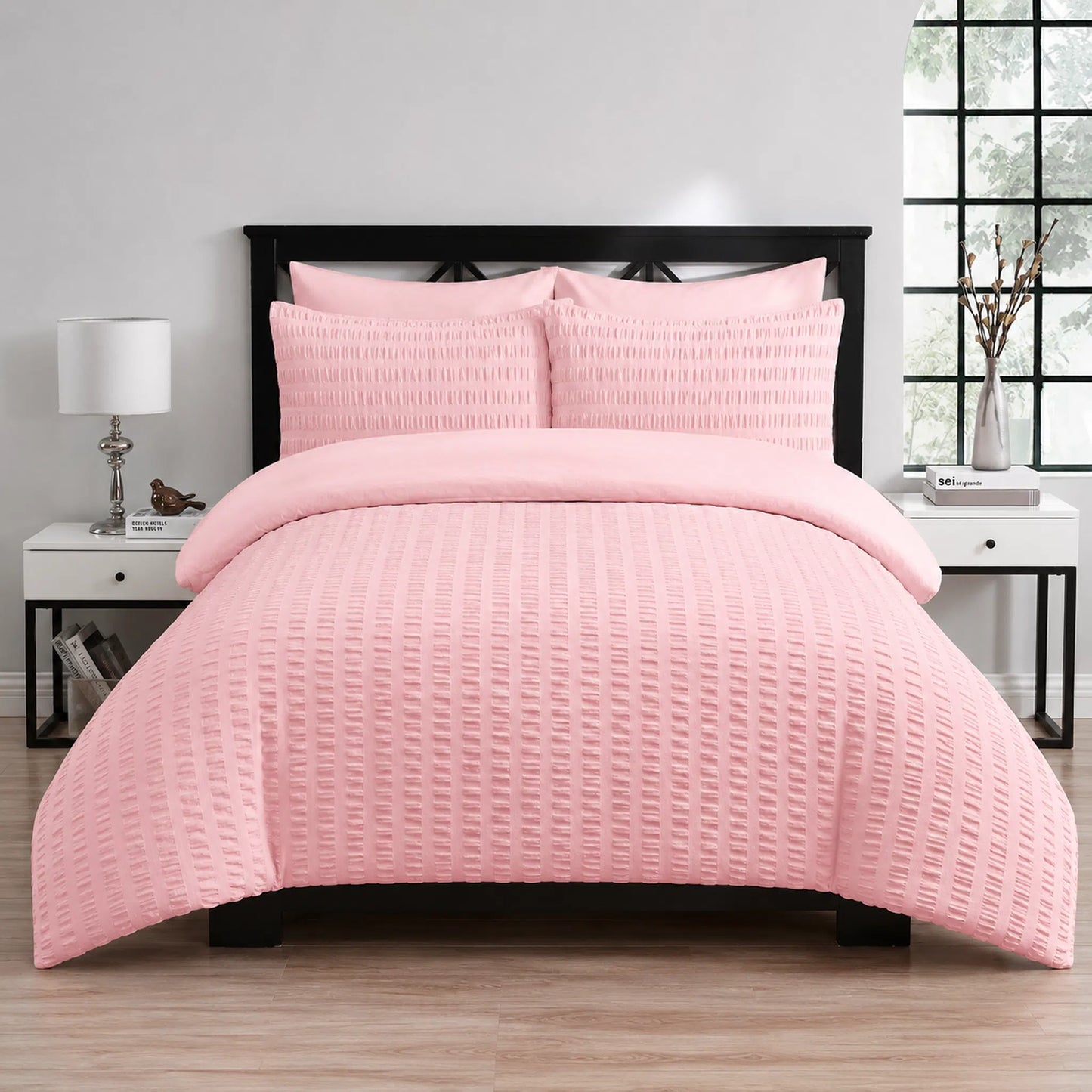 Pink seersucker duvet cover set with matching textured pillowcases