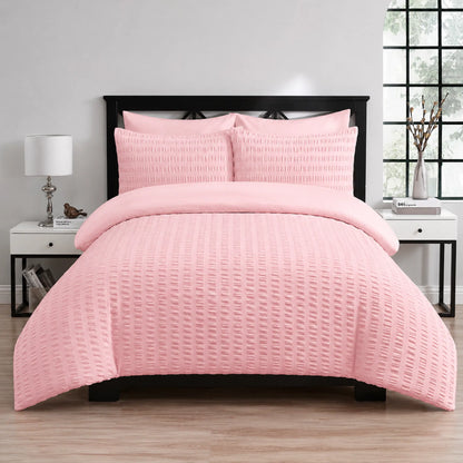 Pink seersucker duvet cover set with matching textured pillowcases