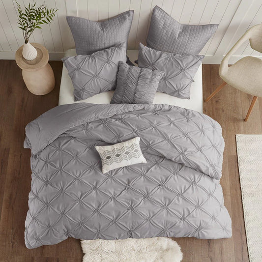 Silver Diamond Pintuck Duvet Cover Set with all-over gathered texture on a bed