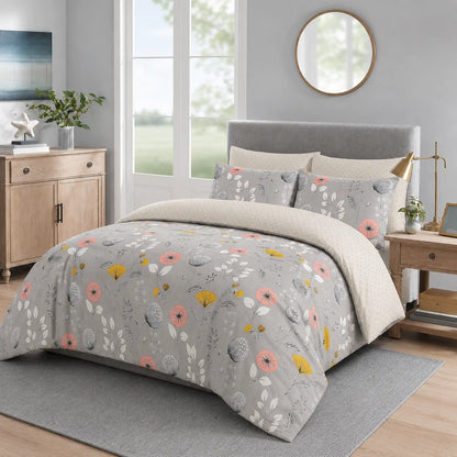 Grey duvet cover set with pink, yellow and white wildflower print styled on a bed