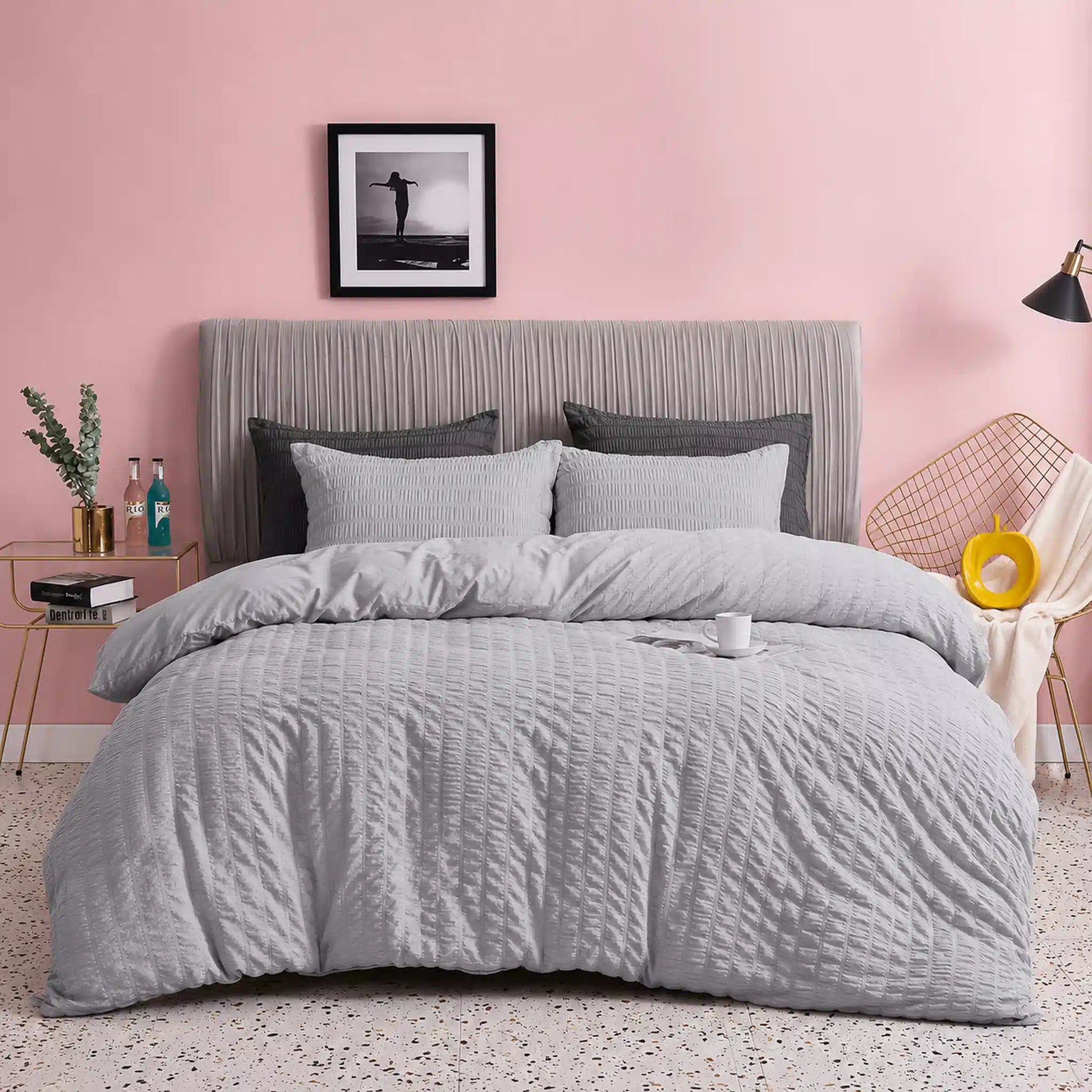 Silver Grey seersucker duvet cover set styled in a pink contemporary bedroom