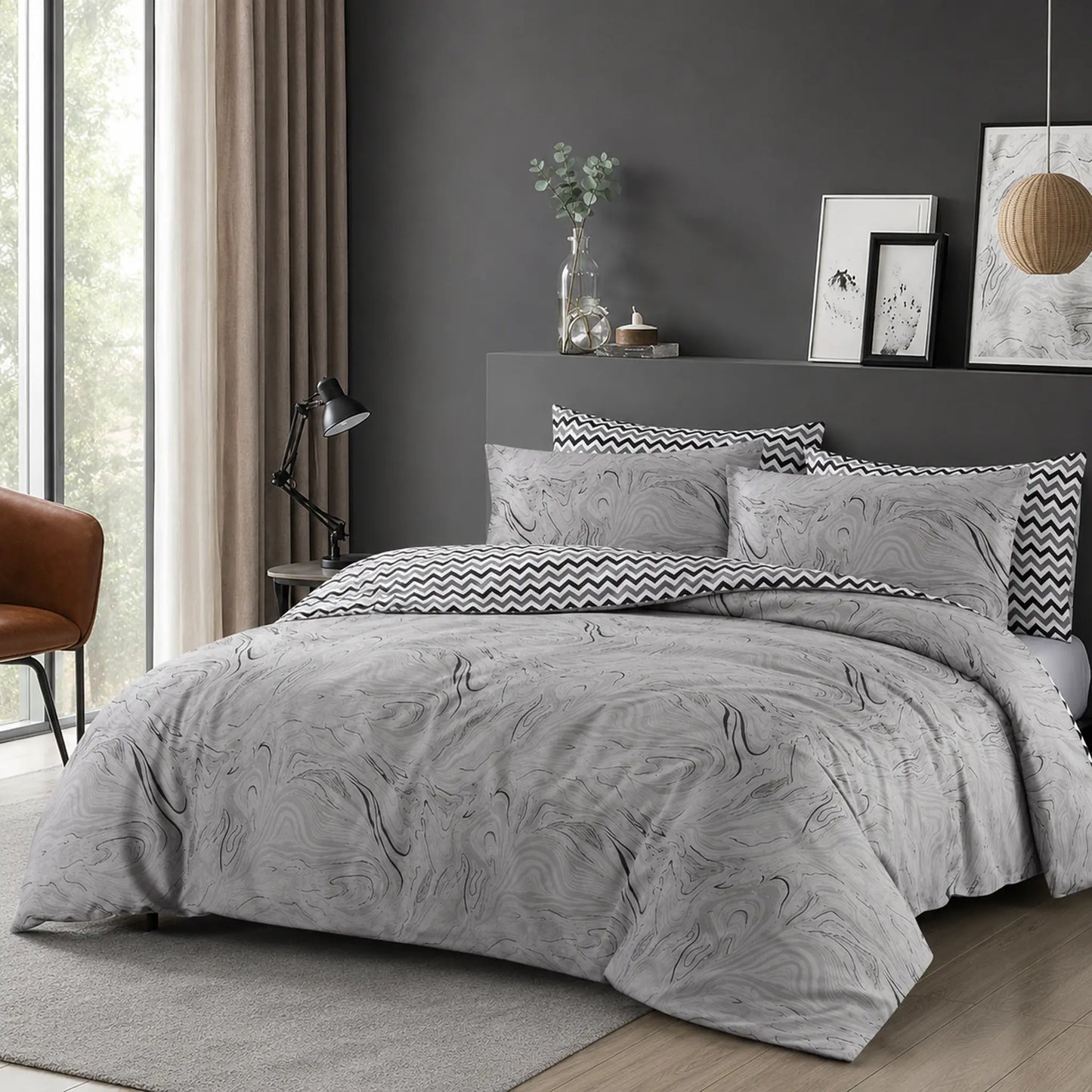 Smokey Wave grey marble print duvet cover set with black and white chevron reverse folded back, styled in a dark grey bedroom — Stoftly UK