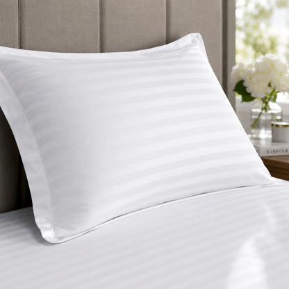 White 600 thread count striped pillowcase on a bed