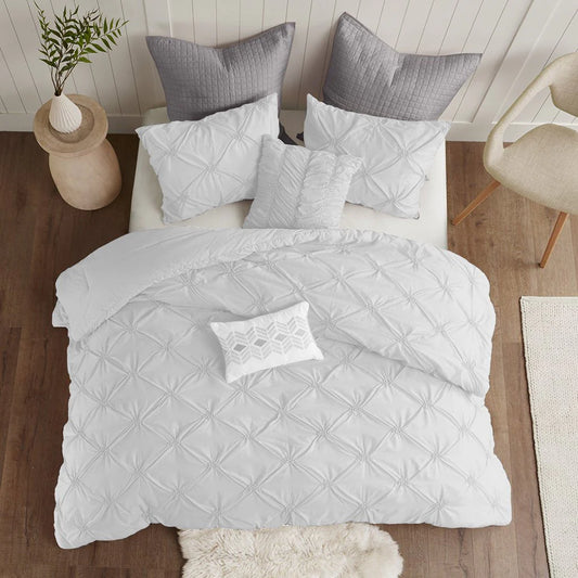 White Diamond Pintuck Duvet Cover Set with all-over gathered texture on a bed